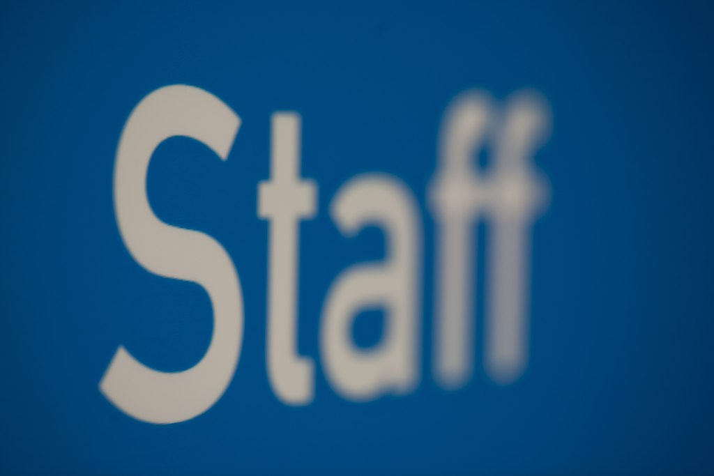 Staff detail in signage panel